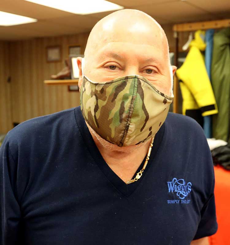Owner Jerry Wigutow wearing a face mask